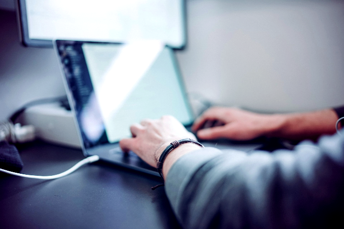 person using laptop